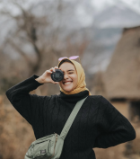 Woman in hijab traveling